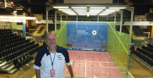Eric Zillmer, Drexel’s Director of Athletics, stands in front of the newly-constructed glass squash court that will be used during the 2011 US. Open Squash Championships. The court is found in the main arena in the DAC.