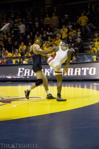 Senior Frank Cimato grapples with Tyler Scotton of Boston University. Cimato defeated Scotton in a win by decision. The Dragons will face Franklin & Marshall College Feb. 8.