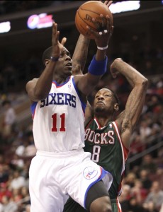 Philadelphia 76ers guard Jrue Holiday drives to the basket against Milwaukee Bucks center Larry Sanders at the Wells Fargo Center in Philadelphia March 27.