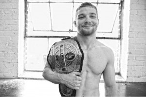 Zach “Fun Size” Makovsky showcases his Bellator Bantamweight Championship belt that he won in 2010 when he defeated Ed West by a unanimous decision. He now competes as a flyweight in Cage Fury Fighting Championships events.