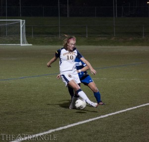 Junior midfielder Megan Hammaker dribbles the ball against a University of Delaware player during Drexel’s 1-0 victory over the Blue Hens Oct. 24, 2012, at Vidas Field. Hammaker tallied two goals and one assist last season.
