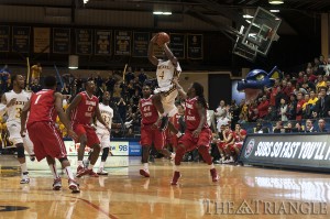 Drexel point guard Frantz Massenat goes up for a running jump shot in an 84-86 overtime loss last season to Illinois State University on Nov. 15. Massenat and the Dragons look to recover from a disappointing last season.