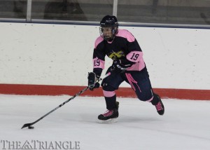 Sophomore Matt Williams swings away from the boards during Drexel’s 6-4 loss to West Chester University Oct. 26 on “Pink In The Rink” night. The forward from Flourtown, Pa., has two goals and two assists for the Dragons this season.