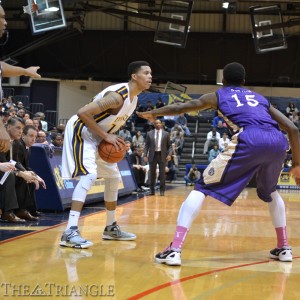 Shooting guard Damion Lee faces up against a James Madison University defender during Drexel’s 60-48 victory over the Dukes last season. The junior has been named to the Preseason All-CAA First Team for the second consecutive season.