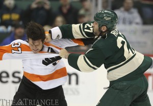 Minnesota Wild left wing Mike Rupp fights Philadelphia Flyers left wing Jay Rosehill during the second period at the Xcel Energy Center in St. Paul, Minn., Dec. 2. The Wild shut out the Flyers 2-0, halting the Orange and Black’s two-game winning streak. Rosehill has one goal and 42 penalty minutes so far this season.