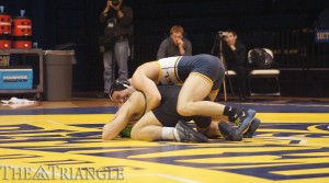 Senior 157-pounder Austin Sommer takes control during his match against Joe Bonaldi of Binghamton University Jan. 22 at the DAC. Sommer lost the bout by a 6-4 decision and the Bearcats defeated the Dragons 22-18.