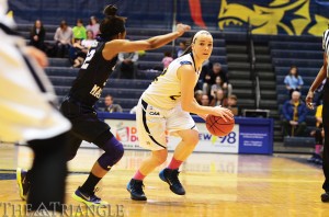 Sophomore guard Meghan Creighton looks for an open teammate during Drexel’s 69-58 loss to James Madison University Feb. 16 at the DAC. The Dragons have dropped two straight games and their overall record now sits at 12-13 on the season.
