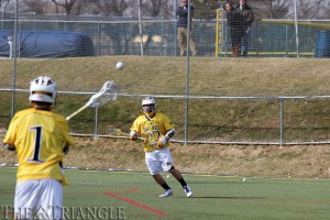 Senior attackers Jared Boudreau (1) and Nick Triziano (22) both notched goals in the past week as the men’s lacrosse team tallied back-to-back wins to improve to 3-2.