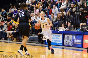 Senior Fiona Flanagan (right) scored nine points on 3-4 shooting and dished out five assists in Wednesday’s Senior Night win over Towson University March 5 at the DAC. It was the women’s basketball team’s final game of the regular season.