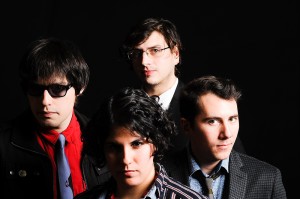 Photo Courtesy Aloud Aloud is a Boston-based indie rock band who uses two lead singers. The four person group (pictured) includes Henry Beguiristain, Jen de la Osa, Charles Murphy and Frank Hegyi. The band is working on their fourth album.