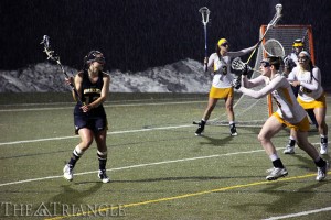 Junior attacker Alissa Watts looks for an open teammate March 12 against La Salle University. The Dragons won that contest, 10-8, but have dropped two in a row heading into their final match of the season on April 26. (Ajon Brodie)