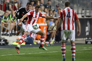 Stoke City F.C. striker Cameron Jerome (33) moves the ball past Philadelphia Union midfielder Roger Torres (10) during the first half in an international friendly at PPL Park on Tuesday, July 30, 2013, in Chester, Pennsylvania. (Andrew Renneisen - MCT Campus)