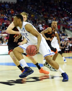 Duke's Jabari Parker (white jersey) drives against Mercer University in the second round of the 2014 NCAA Tournament. (Bob Donnan - USA Today Sports Images)
