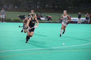 Then-junior midfielder Christina Conrad looks to play the ball against St. Joseph’s University last Sep. 6. The field hockey season starts Aug. 29. (Ajon Brodie - The Triangle)