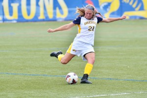 Senior midfielder and team co-captain Alyssa Findlay clears the ball out of the zone against Wagner College September 21. (Photo Courtesy - Ken Chaney)