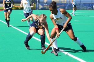 Senior defender Allyson Fuller fights for the ball against a Kent State University player. Fuller and the rest of the defense have been huge, giving up 3 goals in the last 3 games. (Photo courtesy-Jean Friese)