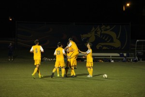 Men's soccer celebrates an early goal against Seton Hall University. (Ajon Brodie - The Triangle)