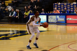 Guard Tavon Allen squares up for a three pointer. (Ken Chaney - The Triangle)