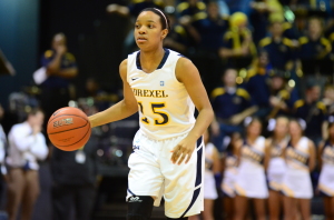 Point guard Carrie Alexander sizes up an opposing defense at the Daskalakis Athletic Center last season. (Ken Chaney - The Triangle)