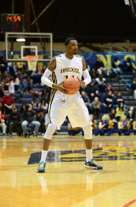 Guard Tavon Allen sizes up the Hofstra University defense during a home game last season. (Ken Chaney - The Triangle)