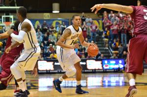 Guard Damion Lee sizes up a defender against St. Joe's Nov. 17. (Ken Chaney - The Triangle)