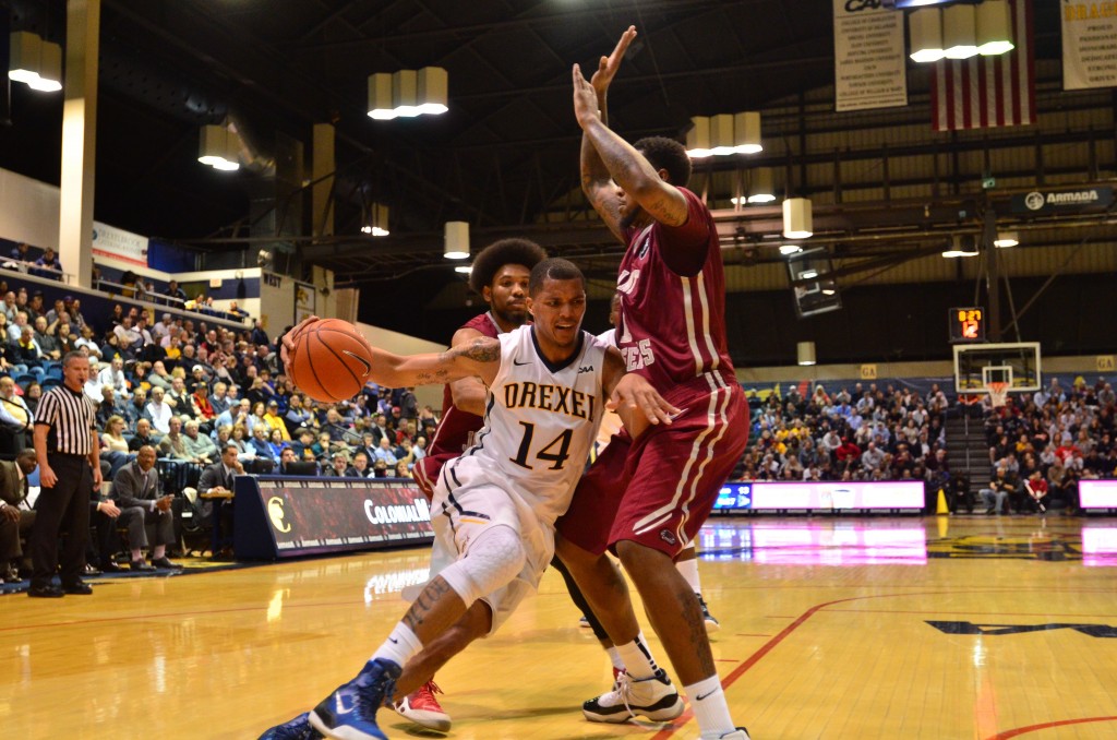 Drexel junior guard Damion Lee drives to the hoop Nov. 17. (Ken Chaney - The Triangle)