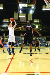 Forward Sarah Curran launches into a jump shot. (Ken Chaney - The Triangle)