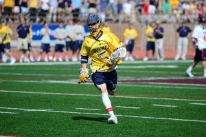 Junior midfielder Jules Raucci charges up the field during the Dragons’ NCAA Tournament game against University of Denver. Raucci is part of the core of upperclassmen trying to lead the team to their second straight tournament run. (Ken Chaney - The Triangle)