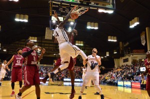 Forward Rodney Williams dunks against St. Joseph's University on Nov. 16. (Ken Chaney - The Triangle)
