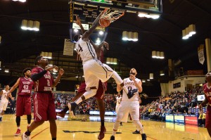 Forward Rodney Williams dunks against St. Joseph's University on Nov. 16. (Ken Chaney - The Triangle)