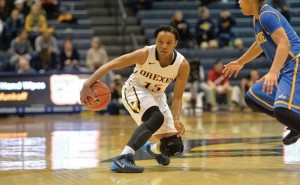 Carrie Alexander makes a move against her defender during the Dragons’ Jan. 25 matchup against the University of Delaware. Alexander was one of the leading scorers for the Dragons this week, scoring 10 points against Towson University and 13 points against James Madison University. (Photo Courtesy - Drexeldragons.com)