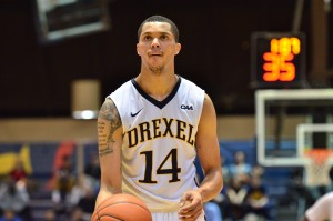 Damion Lee looks up before a free throw Nov. 30. (Ken Chaney - The Triangle)