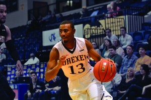 Then-freshman Rashann London drives in a game against the University of Southern Mississippi during the 2014-15 men’s basketball season. (Ken Chaney - The Triangle)