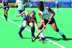 Then-senior Allyson Fuller fights for the ball during a game last September against Kent State University. (Jean Friese - The Triangle)