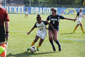 Civanni Moss battles for the ball during the 2014 season. (Ajon Brodie - The Triangle)