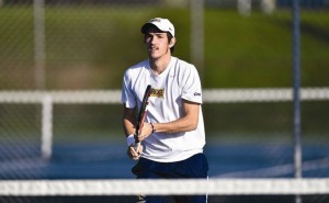 Senior Xabier Saavedra takes his stance in a tennis match earlier this season.  Last weekend at the Princeton Invitational, Saavedra advanced to the singles consolation semifinals and then the Flight 4 semifinals. (Photo Courtesy Drexeldragons.com)