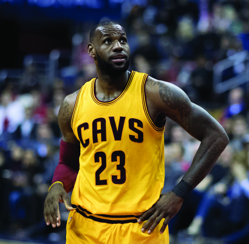 Cleveland Cavaliers LeBron James adjusts his arm sleeve during the
