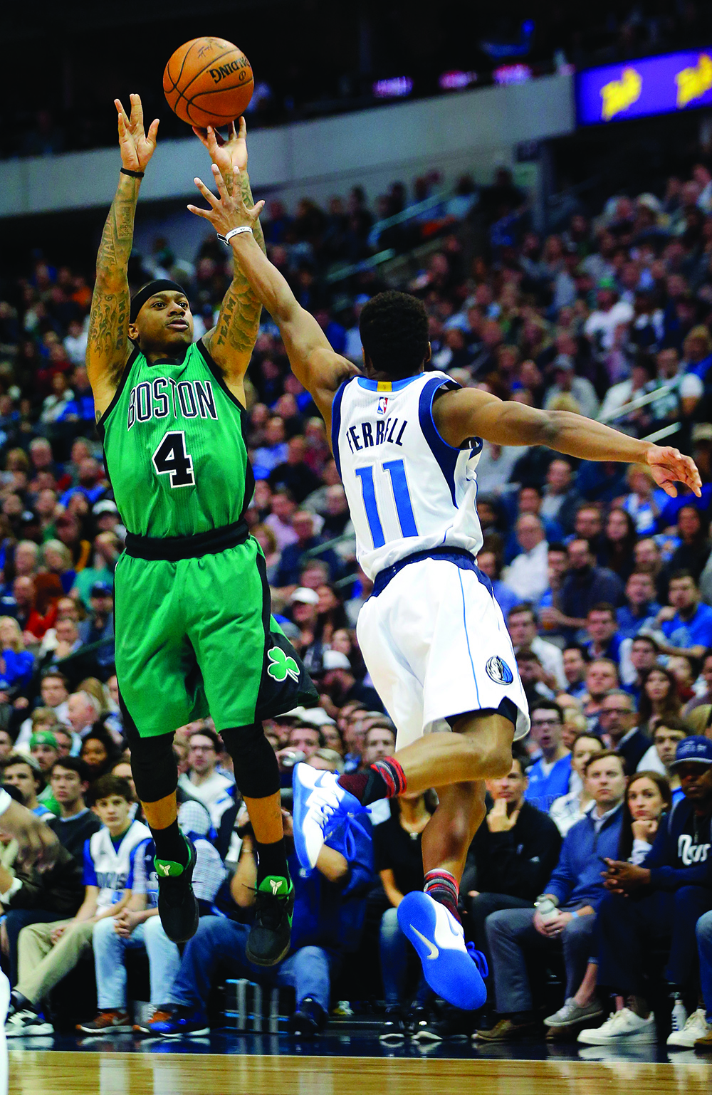 Dallas Mavericks guard Yogi Ferrell (11) tries to get a hand up in the face of Boston Celtics guard Isaiah Thomas (4) during the first half on Monday, Feb. 13, 2017 at the American Airlines Center in Dallas, Texas. (Tom Fox/Dallas Morning News/TNS) NO MAGAZINE SALES MANDATORY CREDIT; NO SALES; INTERNET USE BY TNS CONTRIBUTORS ONLY