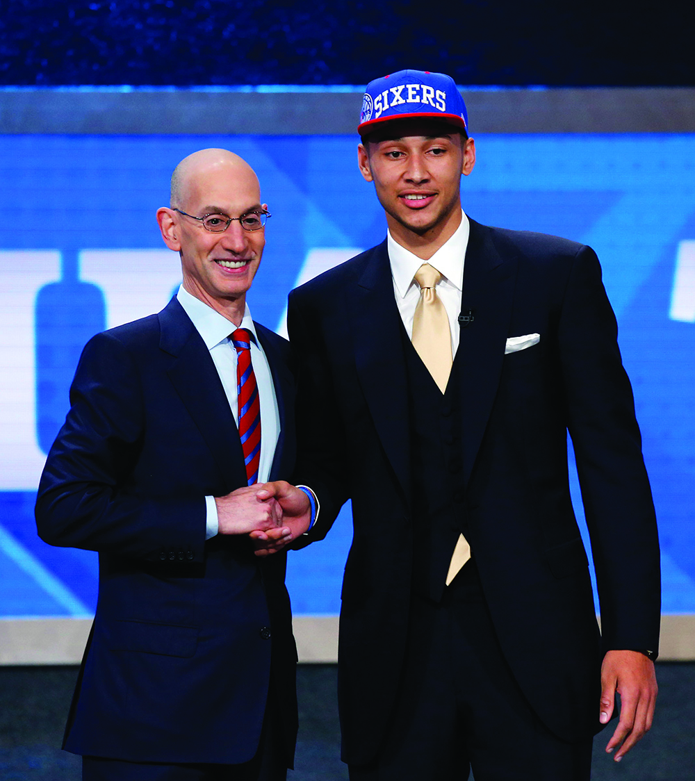 Ben Simmons, the Philadelphia 76ers&apos; first-round, and first overall, draft pick with NBA Commissioner Adam Silver, left, during the NBA Draft on Thursday, June 23, 2016, from Barclays Center in Brooklyn, N.Y. (Yong Kim/Philadelphia Daily News/TNS)