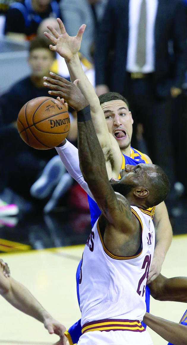 The Cleveland Cavaliers&apos; LeBron James looks to score on the Golden State Warriors&apos; Klay Thompson in the first half in Game 3 of the NBA Finals on Wednesday, June 7, 2017, at Quicken Loans Arena in Cleveland. (Phil Masturzo/Akron Beacon Journal/TNS)