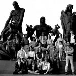 Group photo in front of statues